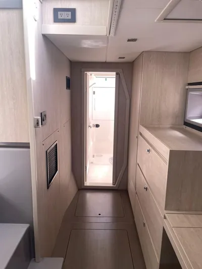 Morning Star Yacht Photos Pics Modern interior of a 2021 Leopard 40 yacht with light wood finishes.