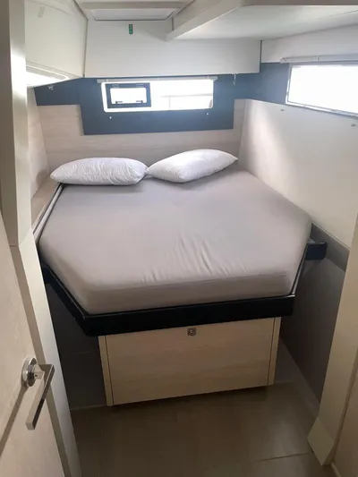 Morning Star Yacht Photos Pics Cozy cabin bedroom in 2021 Leopard 40 catamaran with double bed and pillows.