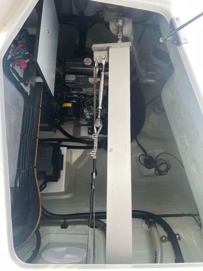 Morning Star Yacht Photos Pics Engine compartment of a 2021 Leopard 40 catamaran, showcasing mechanical components and wiring.