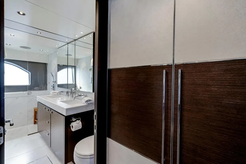  Yacht Photos Pics Luxurious bathroom interior on 2021 Sunseeker 76 Yacht, featuring modern fixtures and elegant design.
