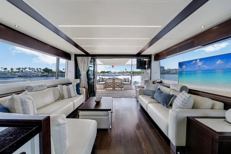  Yacht Photos Pics Luxurious interior of 2021 Sunseeker 76 Yacht with elegant seating and ocean view.