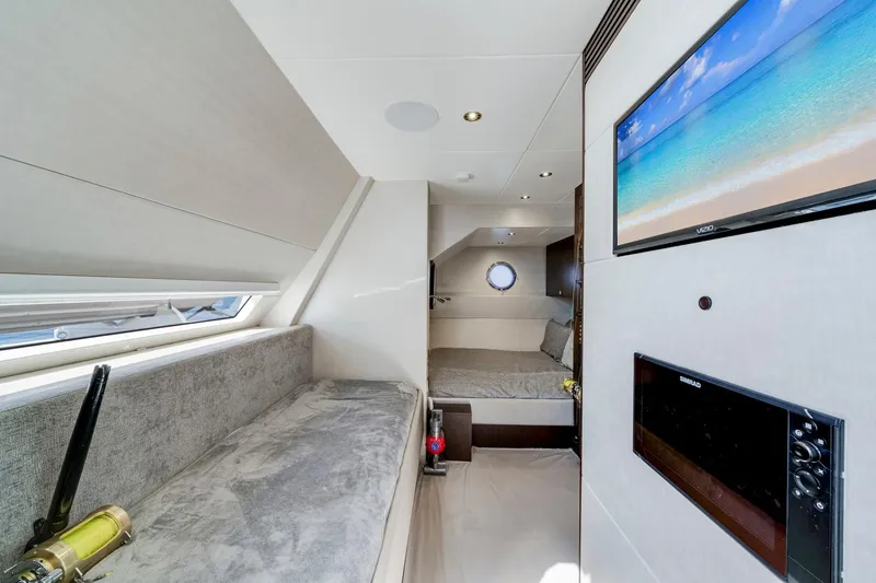  Yacht Photos Pics Luxurious interior of 2021 Sunseeker 76 Yacht with modern amenities and elegant design.