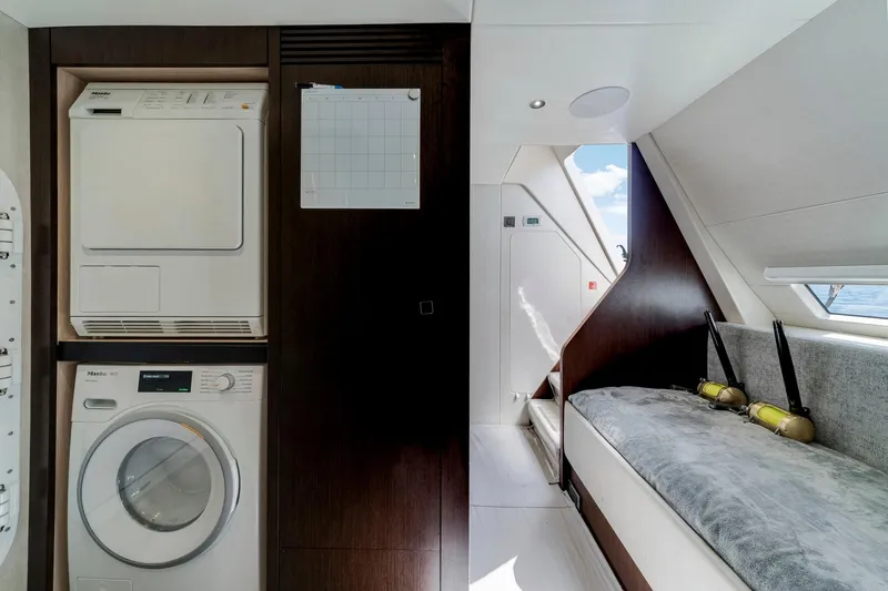  Yacht Photos Pics Laundry area and seating in 2021 Sunseeker 76 Yacht interior.