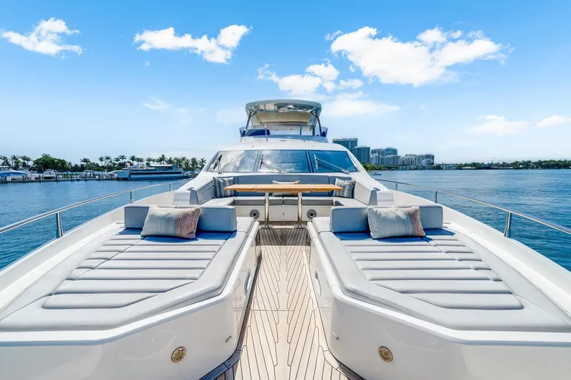  Yacht Photos Pics Luxurious 2021 Sunseeker 76 Yacht with spacious deck and scenic ocean view.