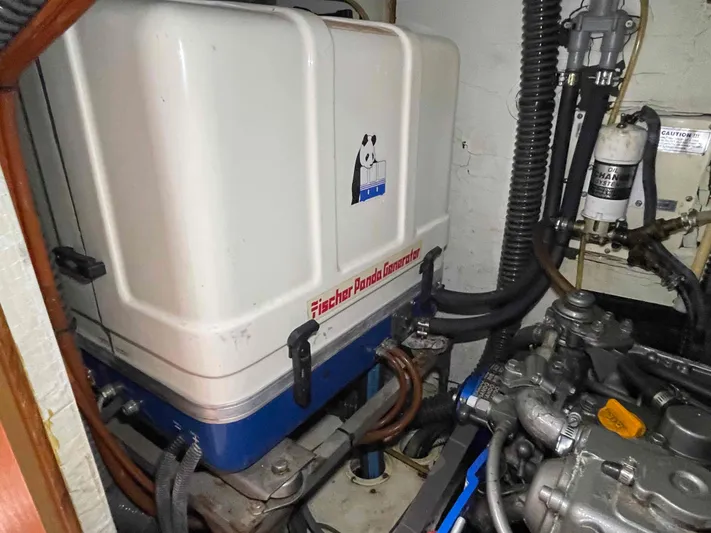 Sapphire Seas Yacht Photos Pics Engine room of 2006 Hunter 45 Center Cockpit with Fischer Panda generator.