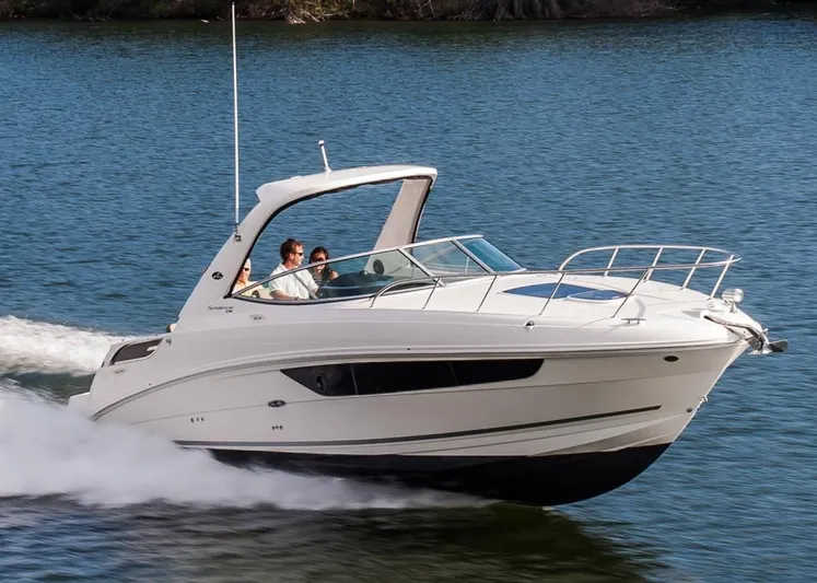 Luna Sea Yacht Photos Pics 2015 Sea Ray 310 Sundancer cruising on water.