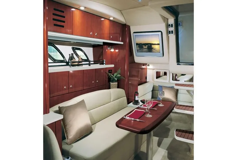 Luna Sea Yacht Photos Pics Luxurious interior of 2015 Sea Ray 310 Sundancer yacht with dining area.