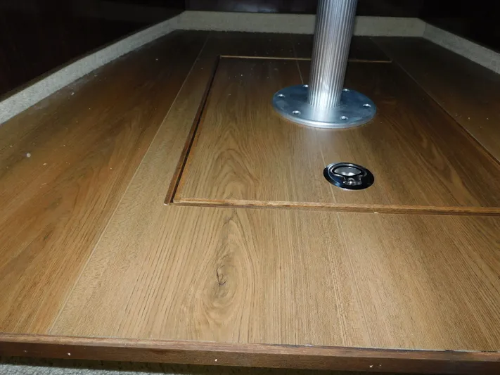 Luna Sea Yacht Photos Pics Wooden table base on 2015 Sea Ray 310 Sundancer boat interior.