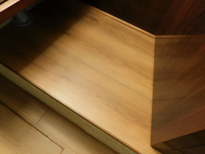 Luna Sea Yacht Photos Pics Wooden interior steps of a 2015 Sea Ray 310 Sundancer yacht.