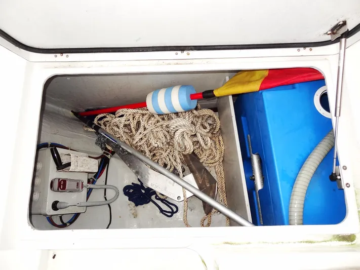 Shamwari Yacht Photos Pics Storage compartment of 2020 Lagoon 46 with ropes, anchor, and buoy.