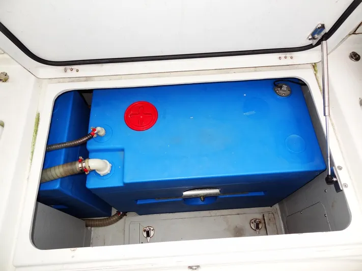 Shamwari Yacht Photos Pics Blue water tank in a 2020 Lagoon 46 yacht compartment.