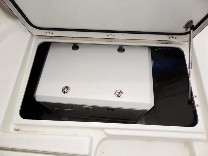 Shamwari Yacht Photos Pics Compartment of 2020 Lagoon 46 yacht, featuring a secured storage box.