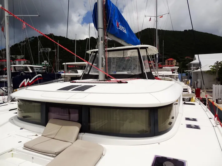 Shamwari Yacht Photos Pics 2020 Lagoon 46 catamaran docked, featuring spacious deck and modern design.