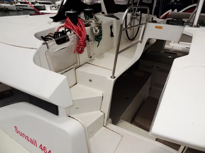 Shamwari Yacht Photos Pics Lagoon 46 catamaran cockpit with stairs, ropes, and steering wheel, 2020 model.