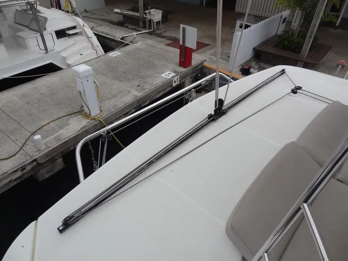 Shamwari Yacht Photos Pics Lagoon 46 catamaran docked, showcasing deck and seating area, 2020 model.