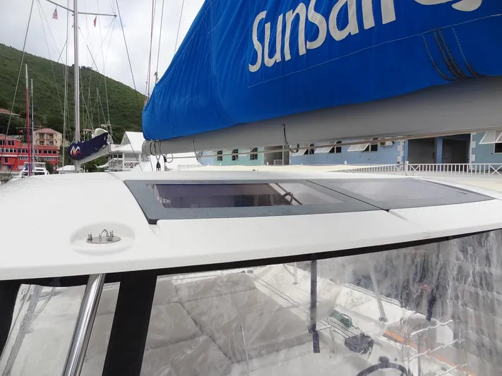 Shamwari Yacht Photos Pics 2020 Lagoon 46 catamaran with blue sail cover, docked at marina.