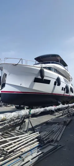  Yacht Photos Pics 2023 Sirena 68 yacht on dry dock, showcasing sleek design and modern features.