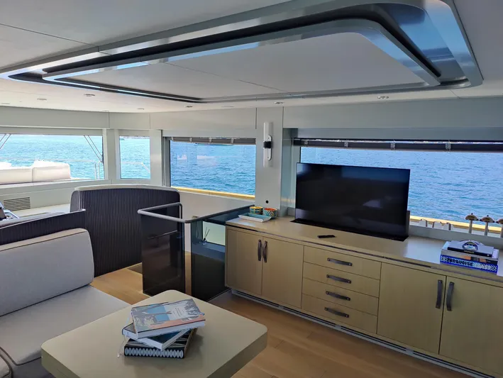  Yacht Photos Pics Luxurious interior of 2023 Sirena 68 yacht with ocean view and modern furnishings.