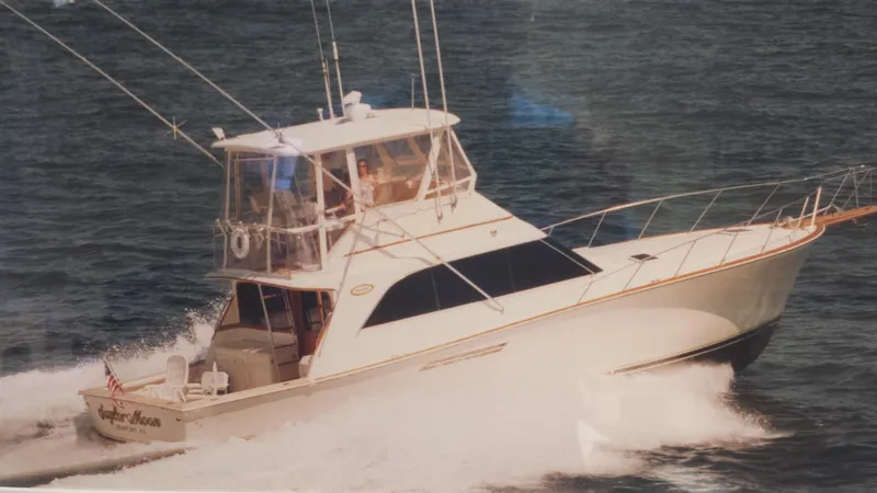 Saylor Moon Yacht Photos Pics 1990 Ocean Yachts 48 Super Sport cruising on open water.