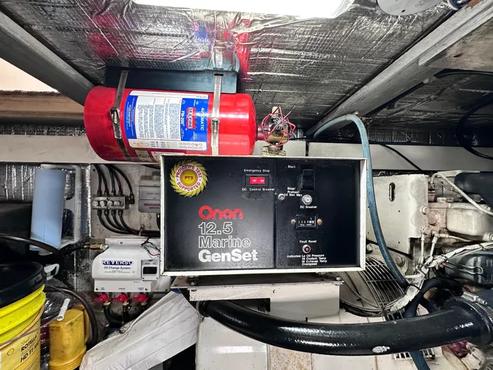 Saylor Moon Yacht Photos Pics Engine room of 1990 Ocean Yachts 48 Super Sport with Onan 12.5 Marine GenSet.