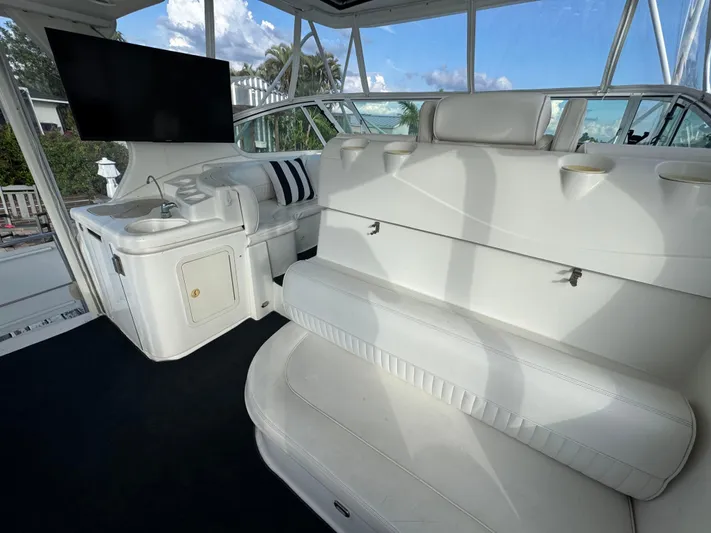 Light & Salty Yacht Photos Pics 16 2003 Cruisers Yacht Sundeck with TV 4.jpg