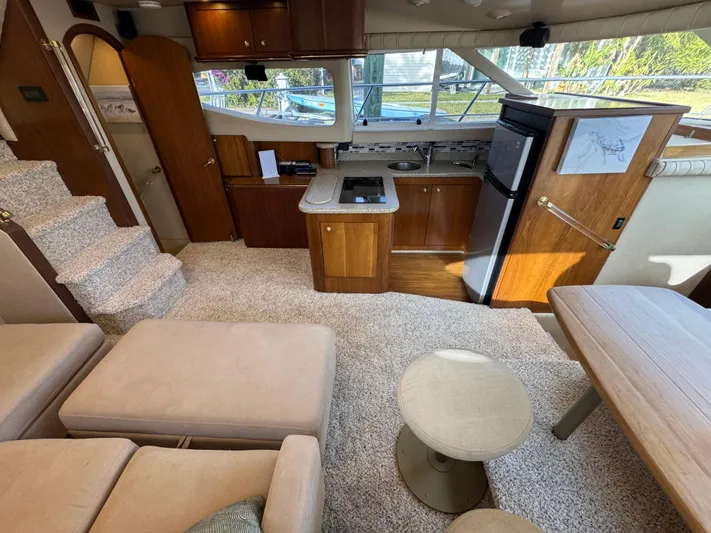 Light & Salty Yacht Photos Pics 24 2003 Cruisers Yacht 4450 Salon Port.jpg