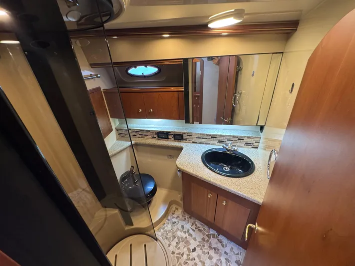 Light & Salty Yacht Photos Pics 48 2003 Cruisers Yacht 4450 Forward Dry Head.jpg