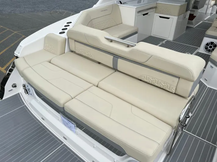  Yacht Photos Pics Luxurious seating on 2022 Regal LS36 boat with beige upholstery.