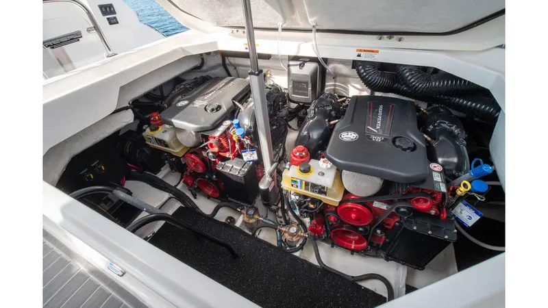  Yacht Photos Pics Engine compartment of 2022 Regal LS36 boat, showcasing dual engines and components.