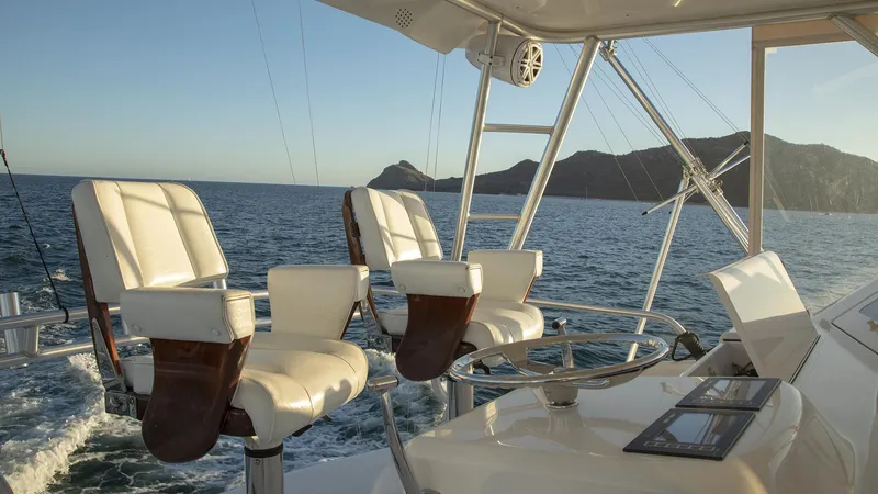 Todo Shine Yacht Photos Pics Luxury helm of 2007 Viking 45 Convertible yacht with ocean view.