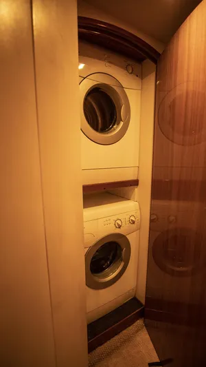 Todo Shine Yacht Photos Pics Stacked washer and dryer in 2007 Viking 45 Convertible yacht interior.