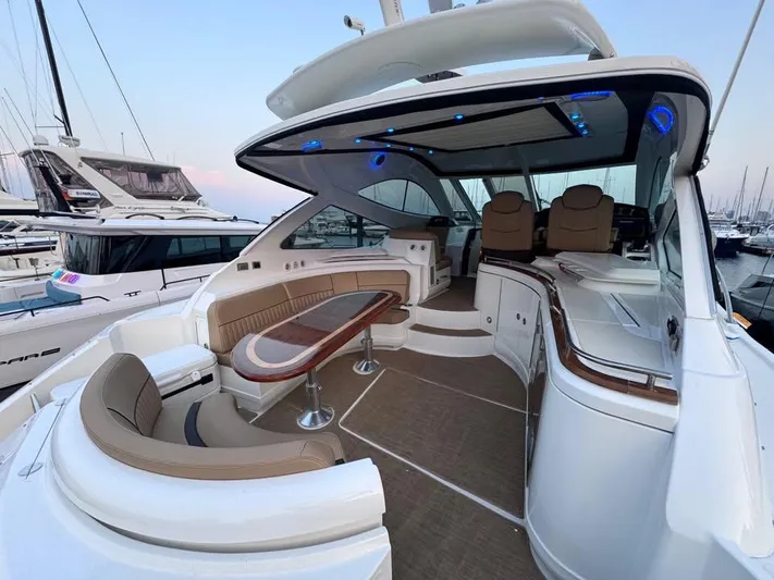  Yacht Photos Pics Luxurious 2014 Cruisers Yachts 540 SC with elegant seating and modern design.
