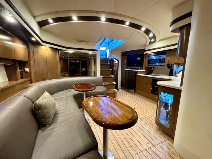  Yacht Photos Pics Luxurious interior of 2014 Cruisers Yachts 540 SC with elegant seating and modern amenities.
