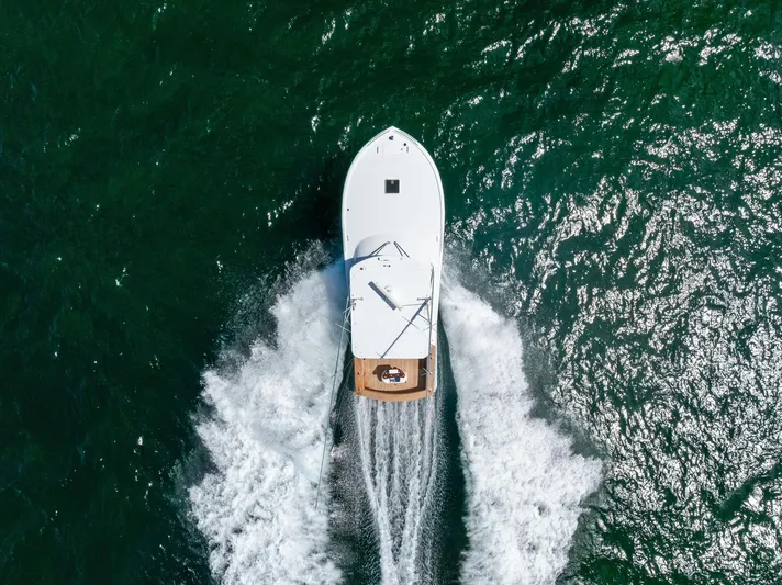 Let's Go Yacht Photos Pics Aerial view of 2018 Custom Carolina 35 Express boat cruising on open water.