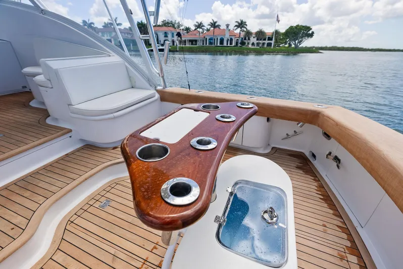 Let's Go Yacht Photos Pics 2018 Custom Carolina 35 Express yacht deck with seating and rod holders.