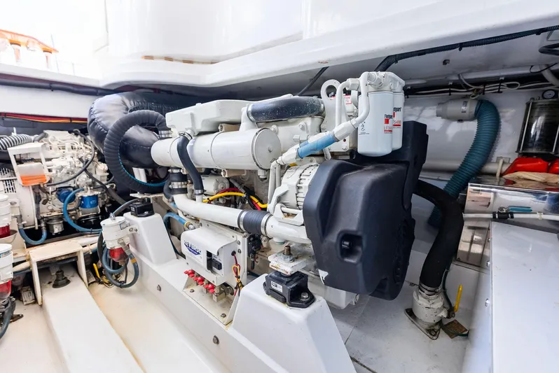 Let's Go Yacht Photos Pics Engine room of 2018 Custom Carolina 35 Express boat, showcasing detailed machinery and components.