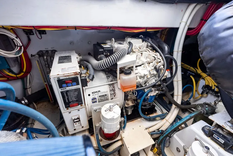 Let's Go Yacht Photos Pics Engine room of 2018 Custom Carolina 35 Express with Kohler power systems and wiring.