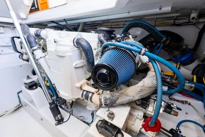 Let's Go Yacht Photos Pics Engine room of 2018 Custom Carolina 35 Express boat, featuring detailed mechanical components.