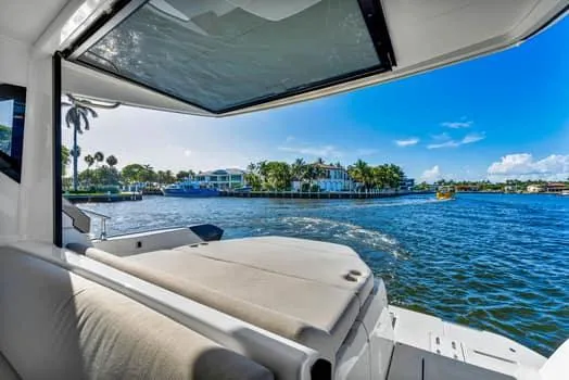 2023 Beneteau Gt45 Yacht Photos Pics 2023 Beneteau Gran Turismo 45 yacht interior with scenic waterfront view.