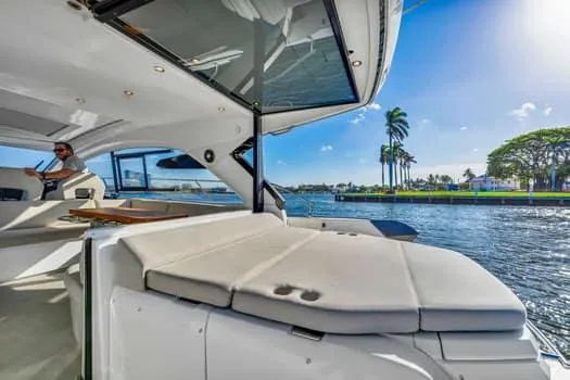 2023 Beneteau Gt45 Yacht Photos Pics 2023 Beneteau Gran Turismo 45 yacht interior with waterfront view and sunny skies.