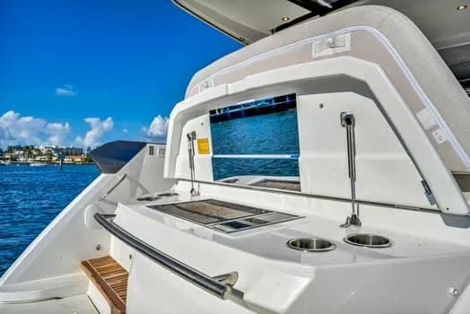 2023 Beneteau Gt45 Yacht Photos Pics 2023 Beneteau Gran Turismo 45 yacht with outdoor kitchen and ocean view.