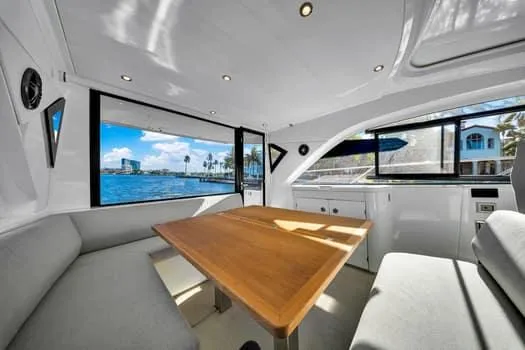 2023 Beneteau Gt45 Yacht Photos Pics Interior of 2023 Beneteau Gran Turismo 45 yacht with elegant seating and ocean view.