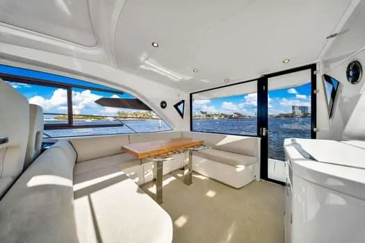 2023 Beneteau Gt45 Yacht Photos Pics Luxurious interior of 2023 Beneteau Gran Turismo 45 yacht with panoramic water views.