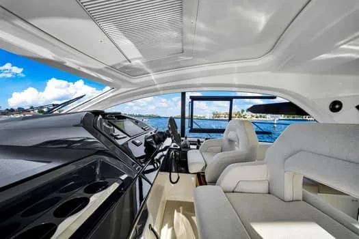 2023 Beneteau Gt45 Yacht Photos Pics Interior of 2023 Beneteau Gran Turismo 45 yacht with modern helm and sea view.