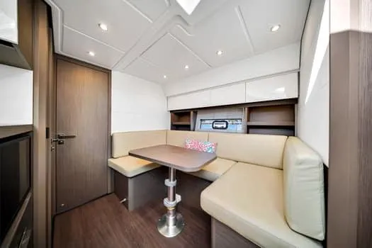 2023 Beneteau Gt45 Yacht Photos Pics 2023 Beneteau Gran Turismo 45 interior with modern seating and table.