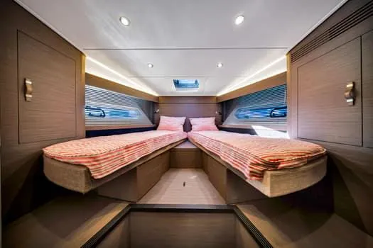 2023 Beneteau Gt45 Yacht Photos Pics 2023 Beneteau Gran Turismo 45 cabin interior with twin beds and modern design.