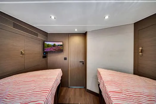 2023 Beneteau Gt45 Yacht Photos Pics Interior cabin of 2023 Beneteau Gran Turismo 45 with twin beds and modern decor.