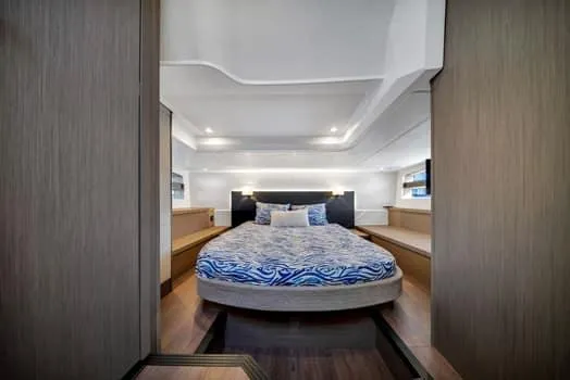 2023 Beneteau Gt45 Yacht Photos Pics Luxurious cabin interior of 2023 Beneteau Gran Turismo 45 yacht, featuring a stylish bed.