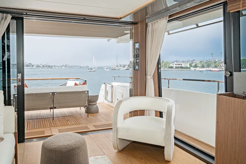  Yacht Photos Pics Luxurious interior of 2024 Prestige X60 yacht with scenic ocean view.