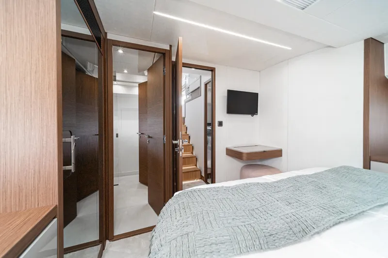  Yacht Photos Pics Luxurious interior of 2024 Prestige X60 yacht with modern design and wooden accents.